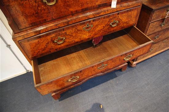 An early 18th century walnut chest on chest, W.3ft 5in. D.1ft 9in. H.6ft 3in.